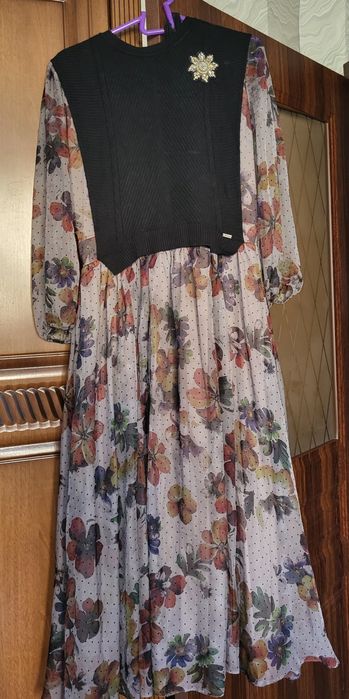 Женская одежда .