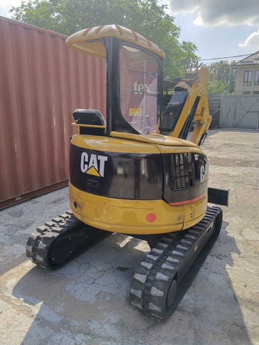 Миниэкскаватор Caterpillar