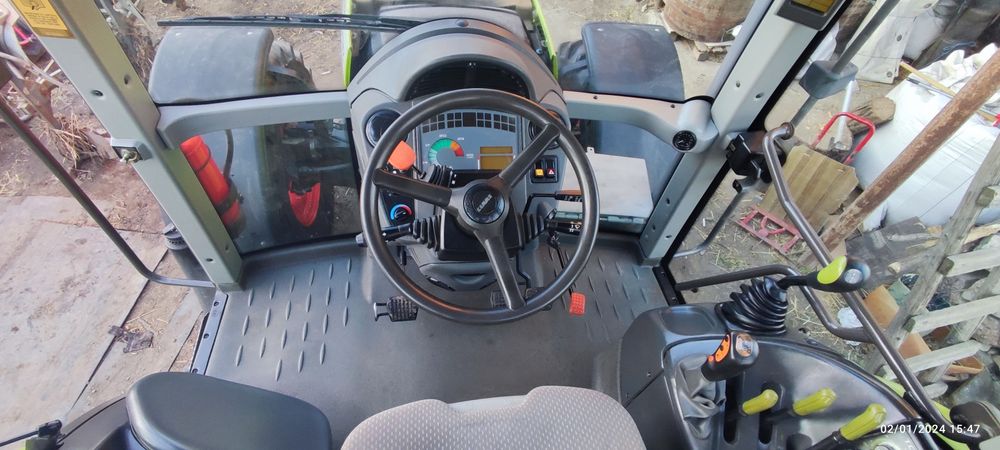 Tractor Claas Ares 577 ATZ + plug