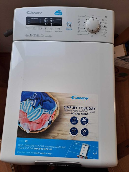 Пералня Candy с горно пълнене