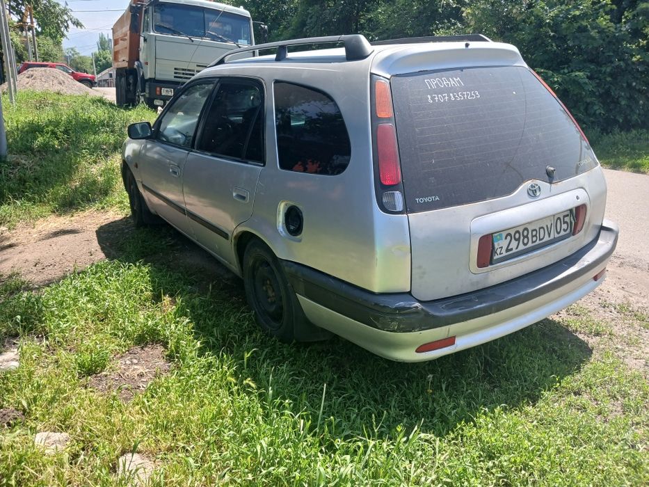 Тойота королла е110