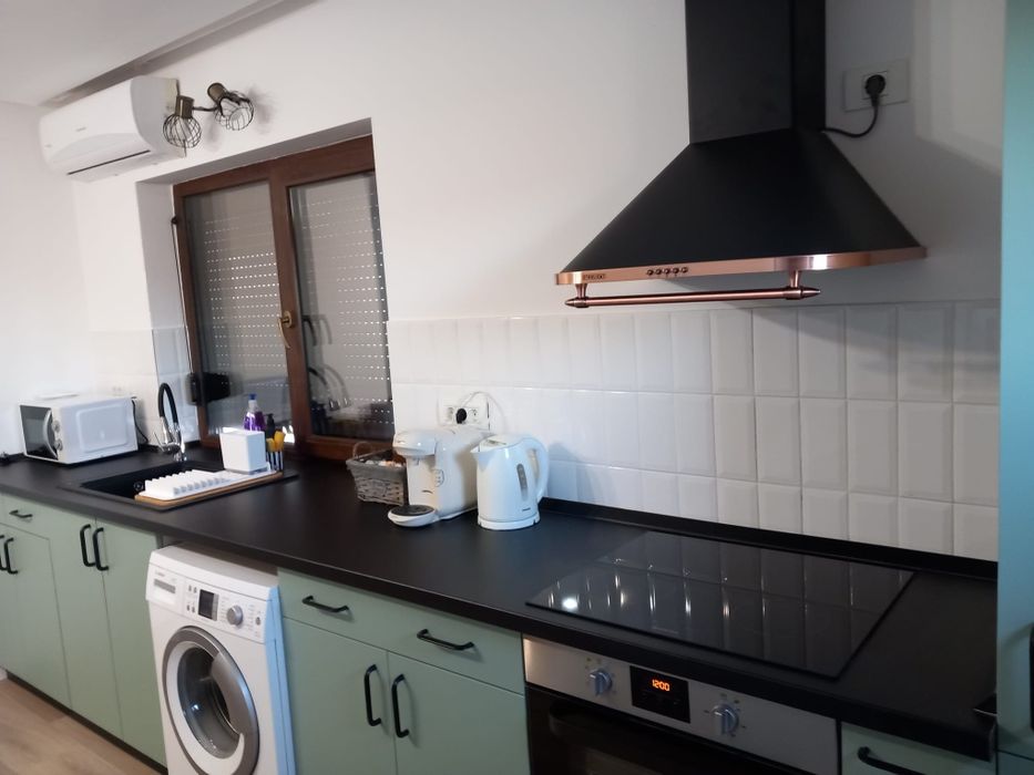 Apartament cu o camera, loc de parcare, curte privata