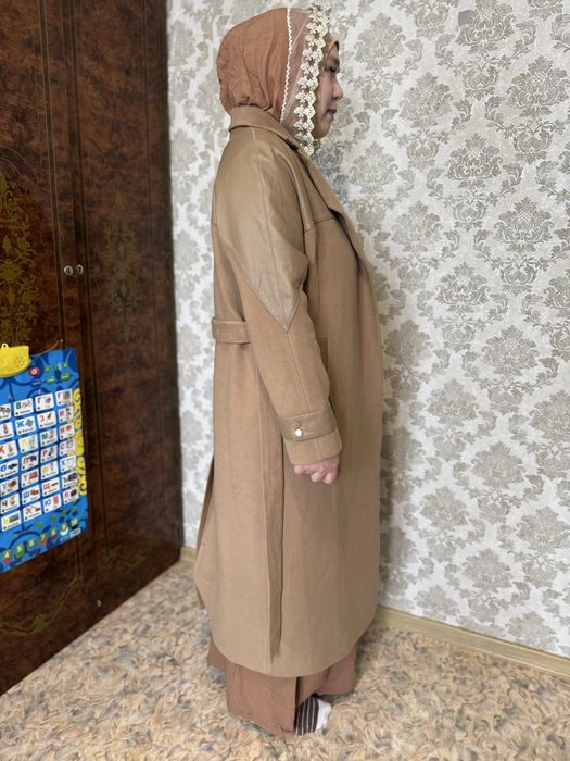 Продам пальто новый