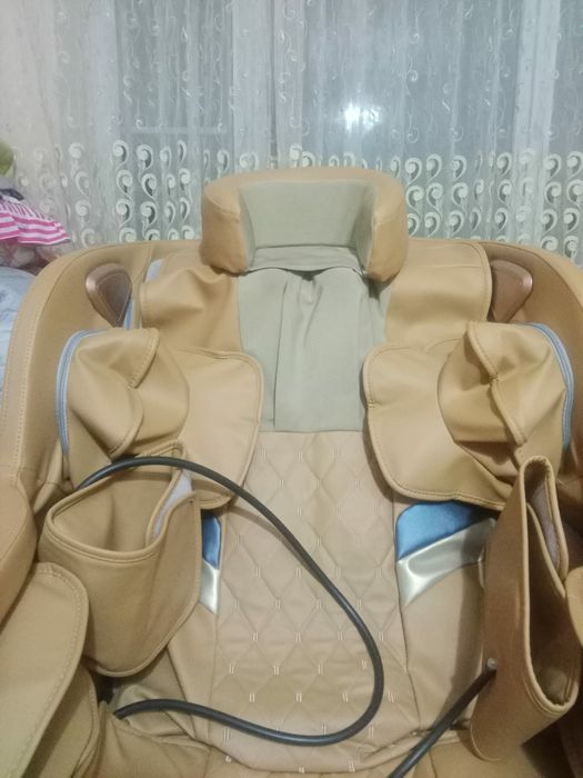 Массажный кресло