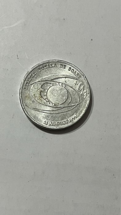 Moneda comemorativa eclipsa 1999