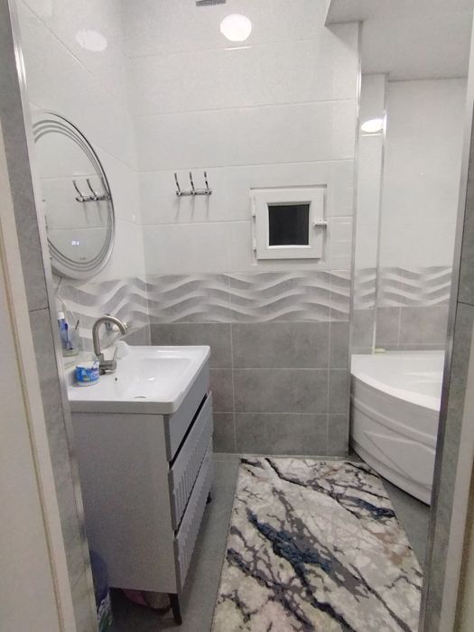 Чирчик ш. 10 м/н Васмой бозор новостройка кирпичный дом 2/5/9 62 м²