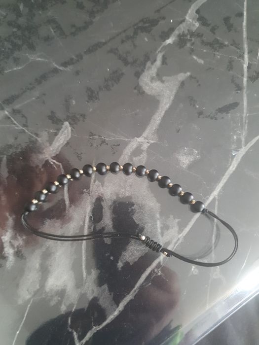 Vand Bratara onix cu bile de aur 14K