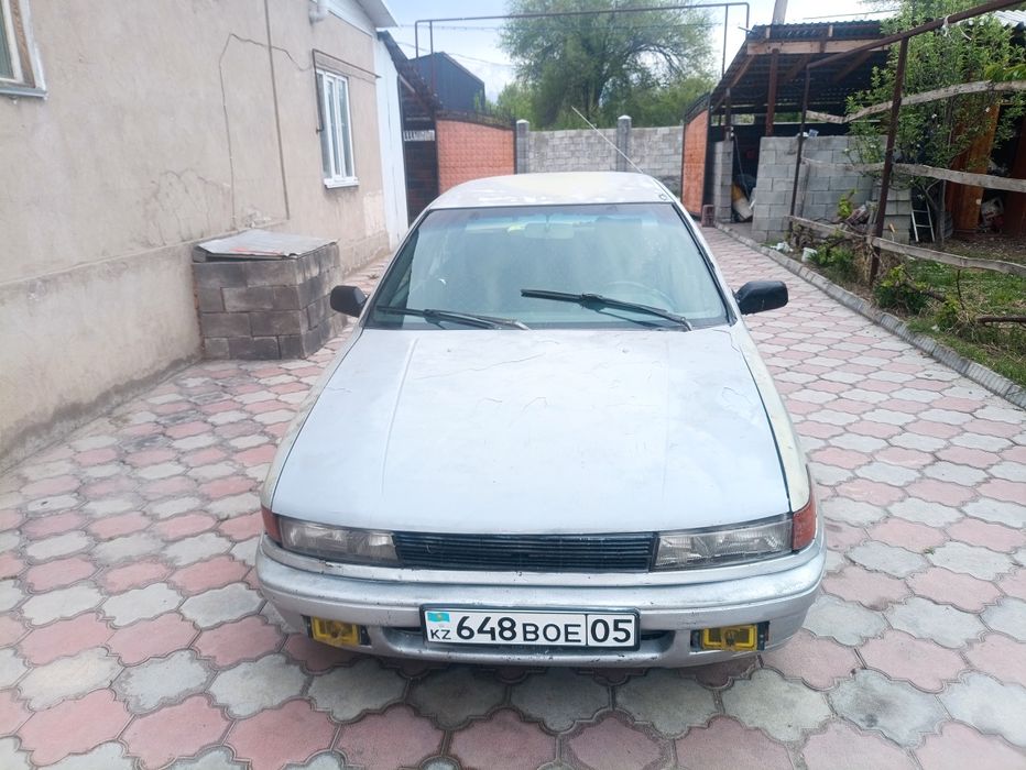 Митсубиси Лансер 6