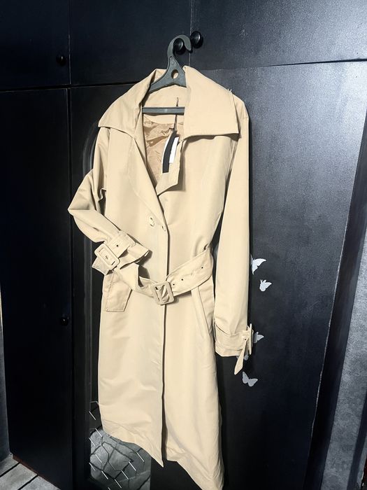 Продам тренч новый