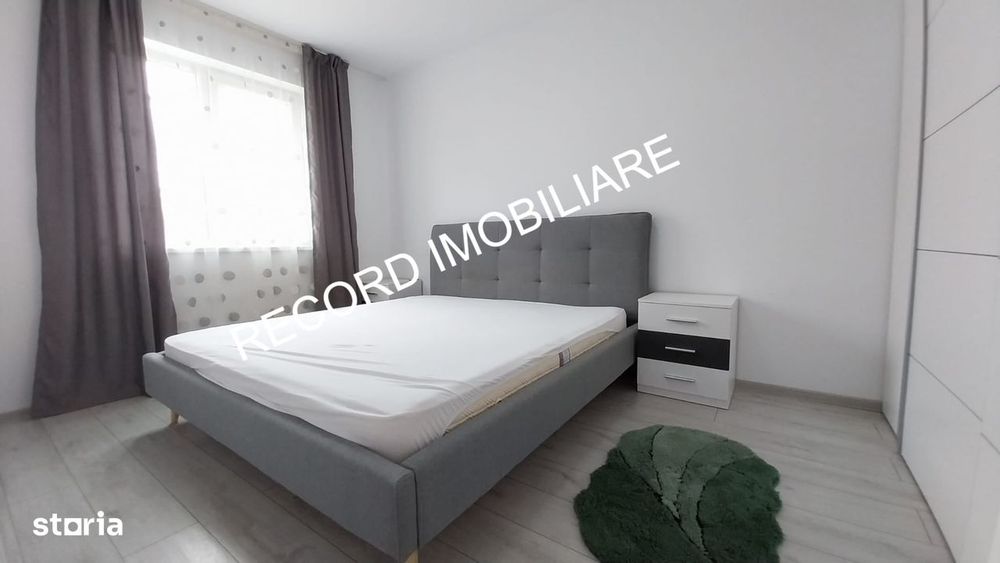 Apartament 2 camere, et.2, balcon, garaj subteran, lift Floresti — fotografia 1