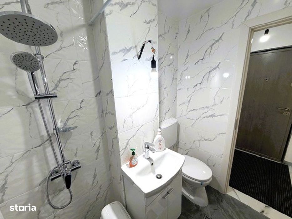 Garsonieră complet renovată, ideală locuință sau spațiu comercial