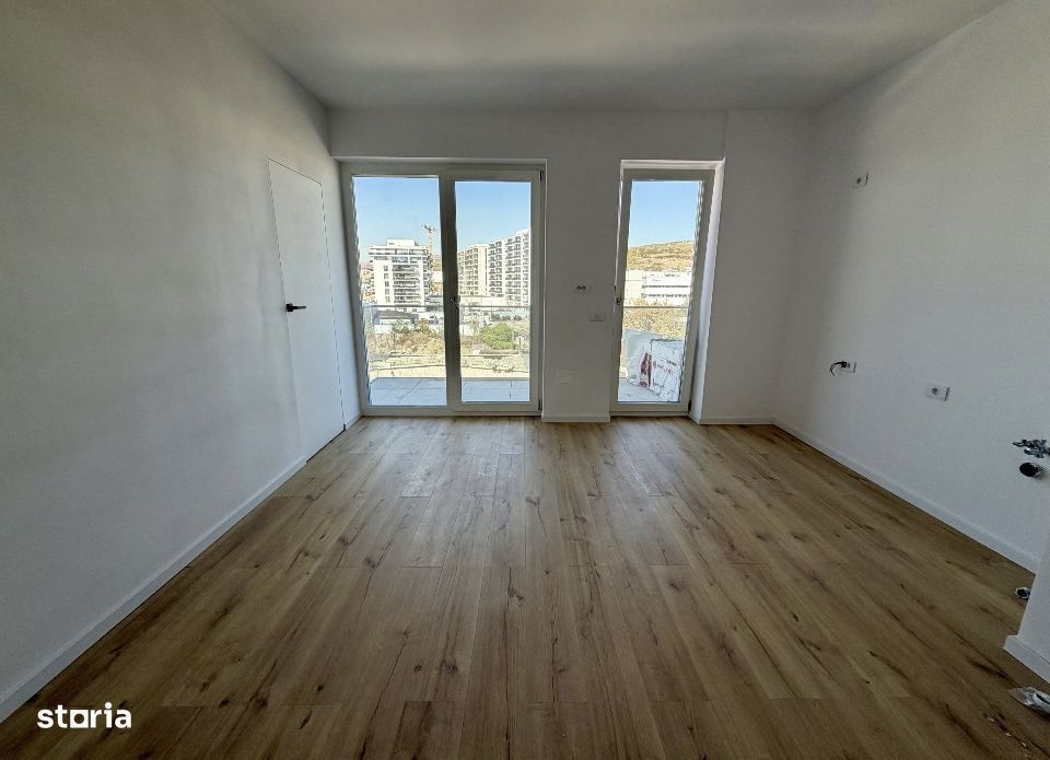 Apartament 2 camere finisat , etaj intermediar  , zona Elite Junior