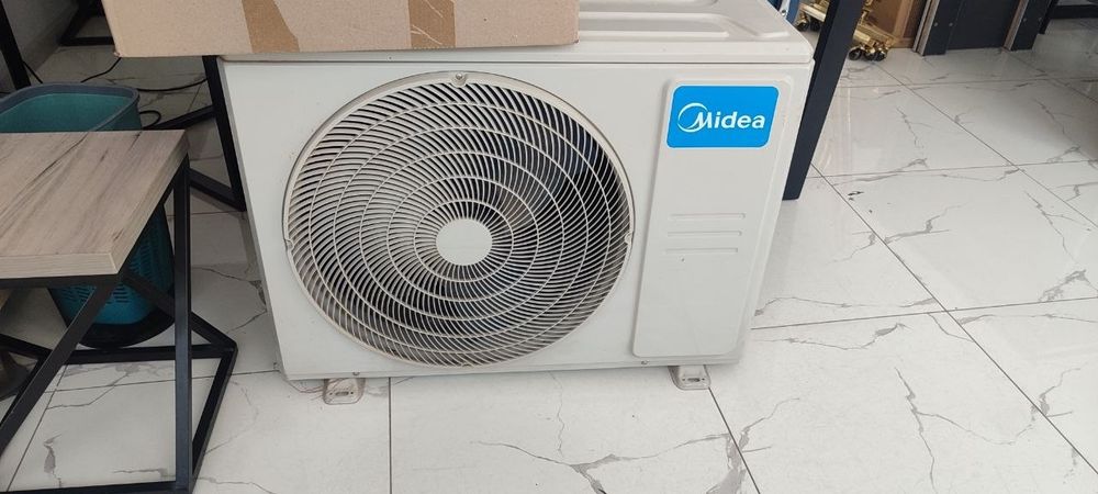 Кондиционер марки Midea