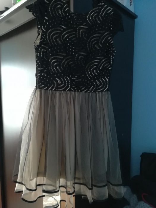 Rochie de ocazie de cul.neagra cu crem,este int-o stare f buna