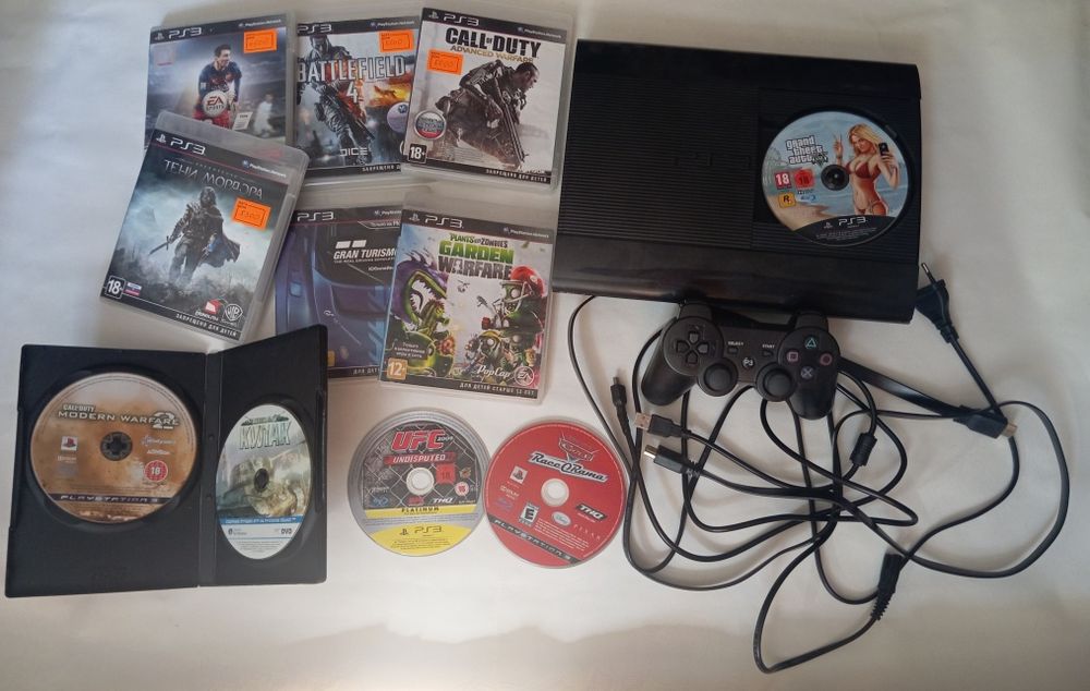 PS3 прошитая+11 дисков лицензионных