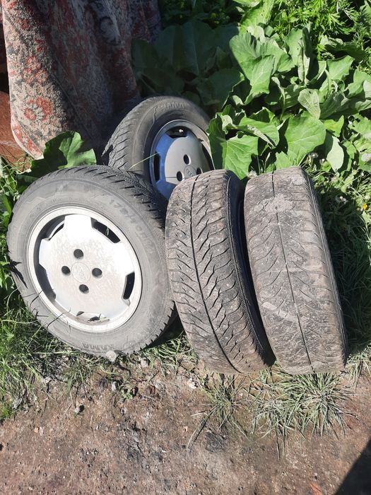 Продам титановые диски с резиной