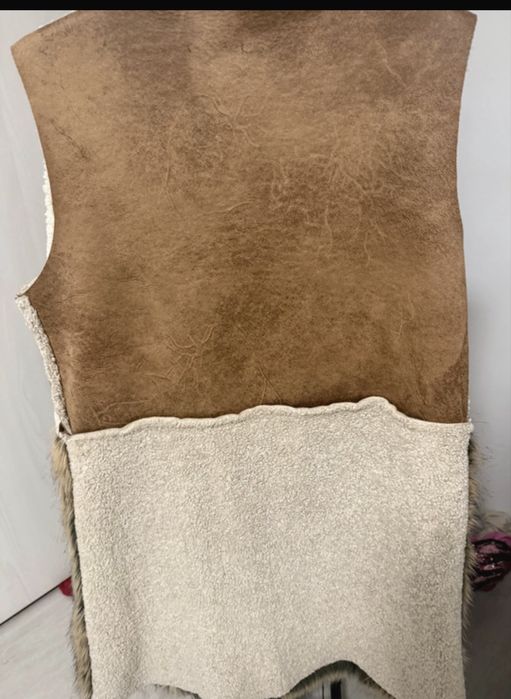 Vesta lunga de blana