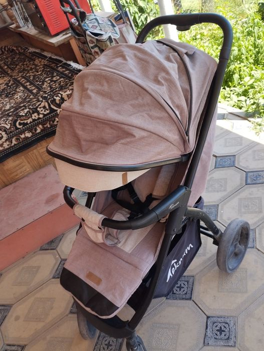 Детская коляска фирмы Teknum