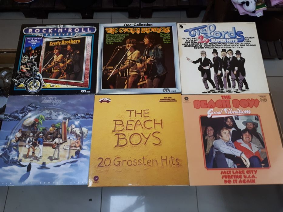 пластинки Elton John и др.