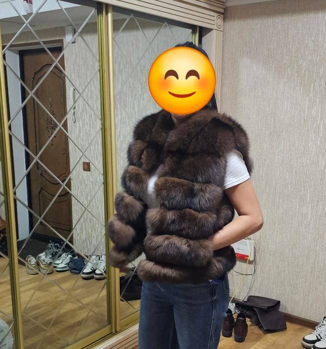 Продам жилетку новую