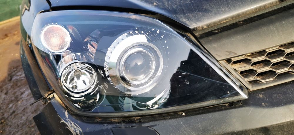 Capota bara far stanga dreapta faruri xenon Opel astra gtc H 1.9cdti