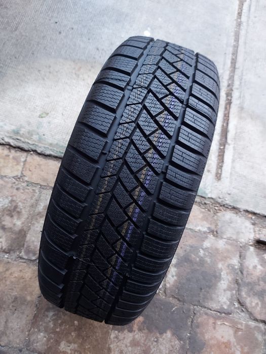 O bucată 205/60 R16 M+S iarnă - una Continental