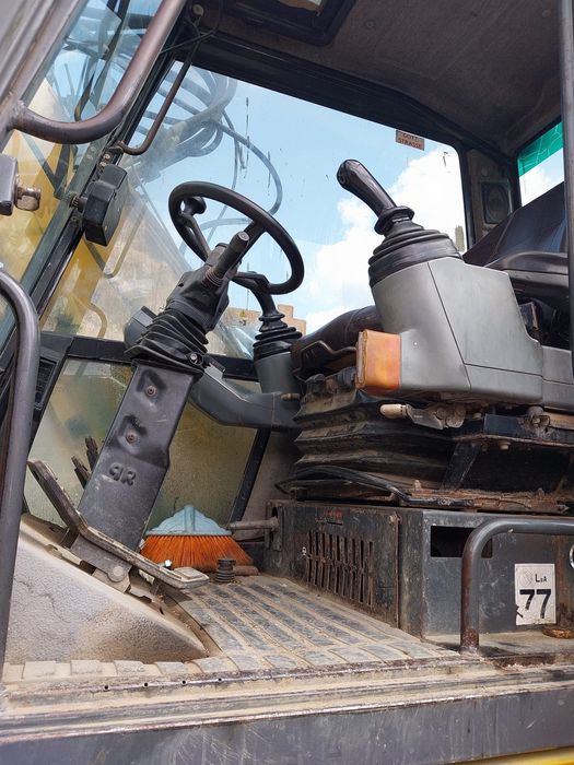 Exacavator pe pneuri Case 788