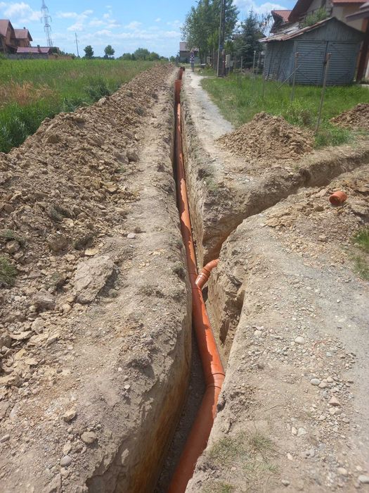 Execut lucrari de canalizare si fose septice