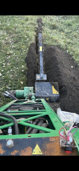 Услуги траншеекопателя бара . Прокладка кабеля.