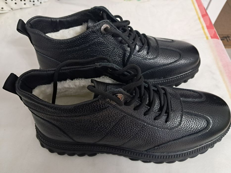 Продам новый зимний ботинок