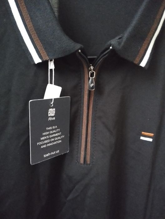 футболки 2 штуки.1 с воротником.2 без воротника.абсалютно новый.