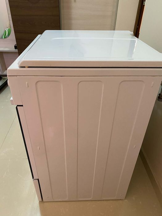 Готварска печка Beko с 2 газови и 2 ел котлона и фурна