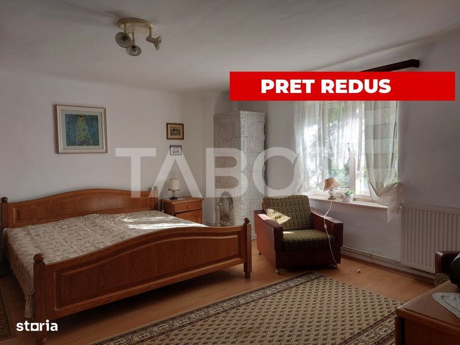 Casa de vanzare cu 2 apartamente separate si teren 500 mp Cisnadioara