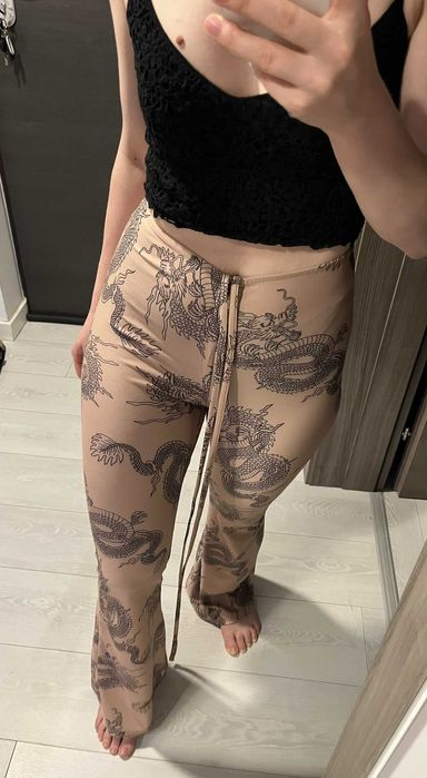 Pantaloni evazați cu imprimeu dragon
