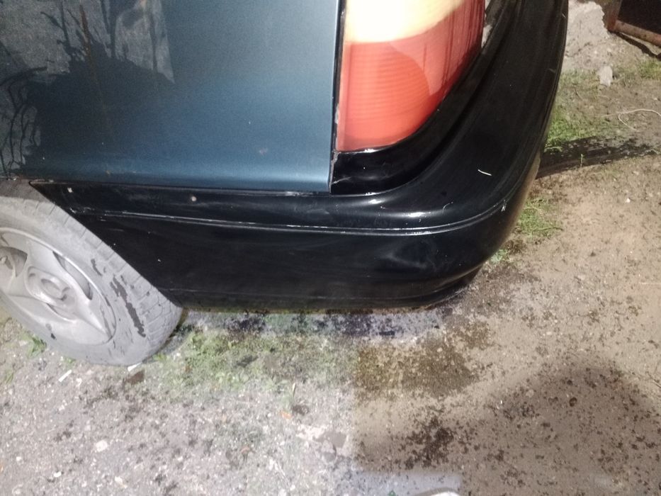 Задний бампер део нексия