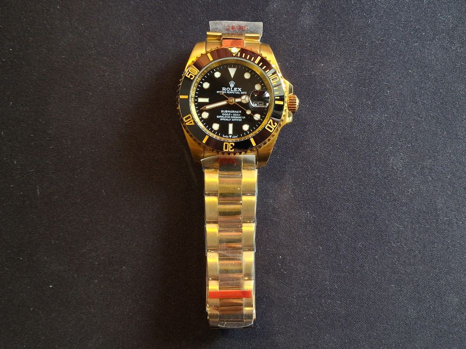 Rolex  Submariner, Day-Date Gold