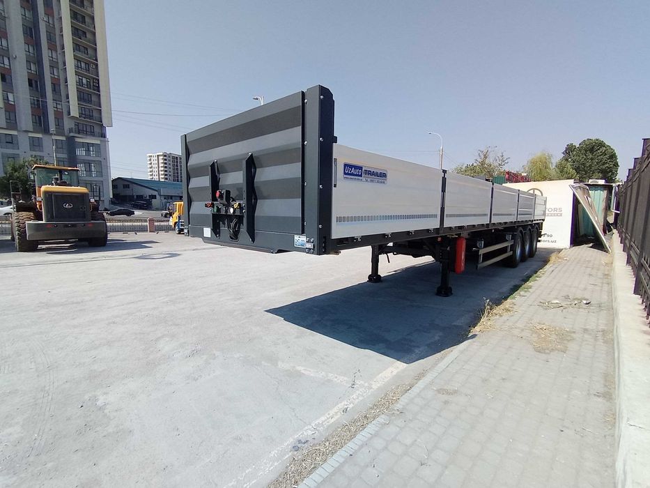 Полуприцеп бортовой контейнеровоз UzAutoTrailer