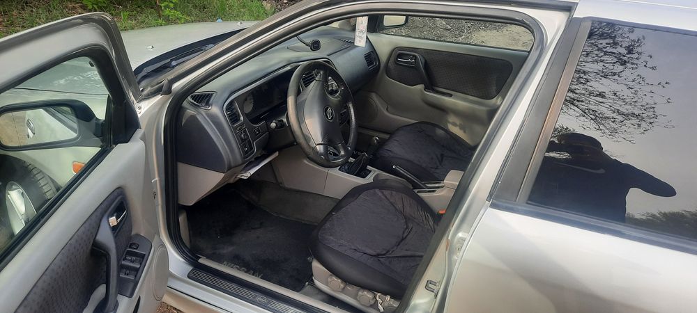 Нисан примьера p11