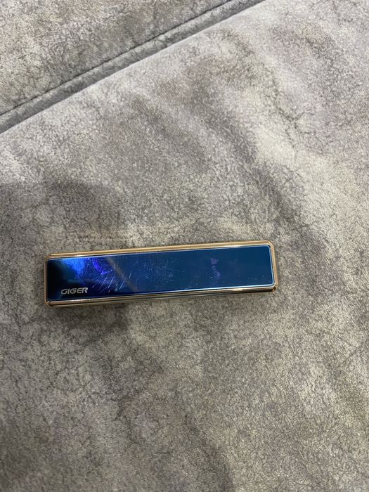 Зажигалка GIGER .