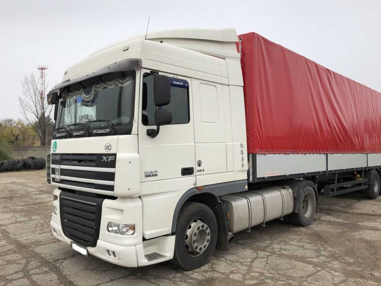 Куплю даф б у. DAF XF 105 сцепка. DAF XF 105 С полуприцепом. DAF 105 XF тент. DAF XF 95 C прицепом.