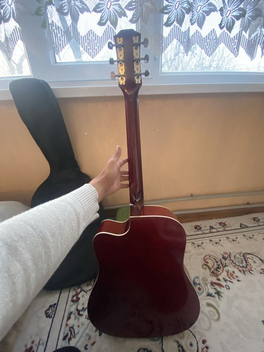 Гитара новый колданылмаган