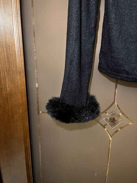 Кофточка с пушистыми рукавами