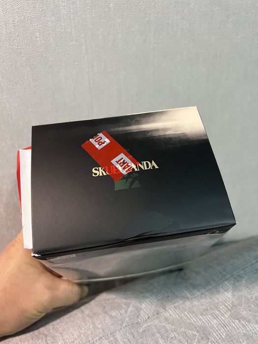 POPMART Скулпанда в костюме панды