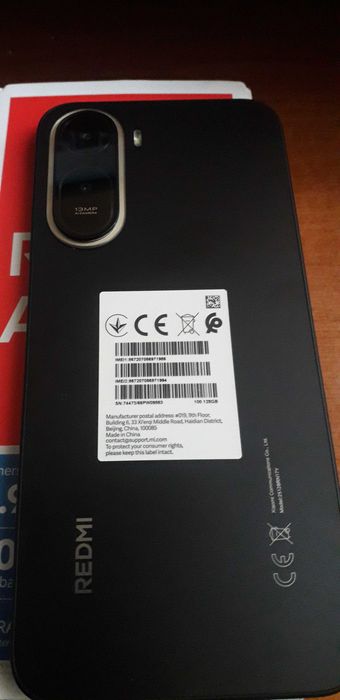 Smartphone Redmi A7 Pro si Nokia Asha 214