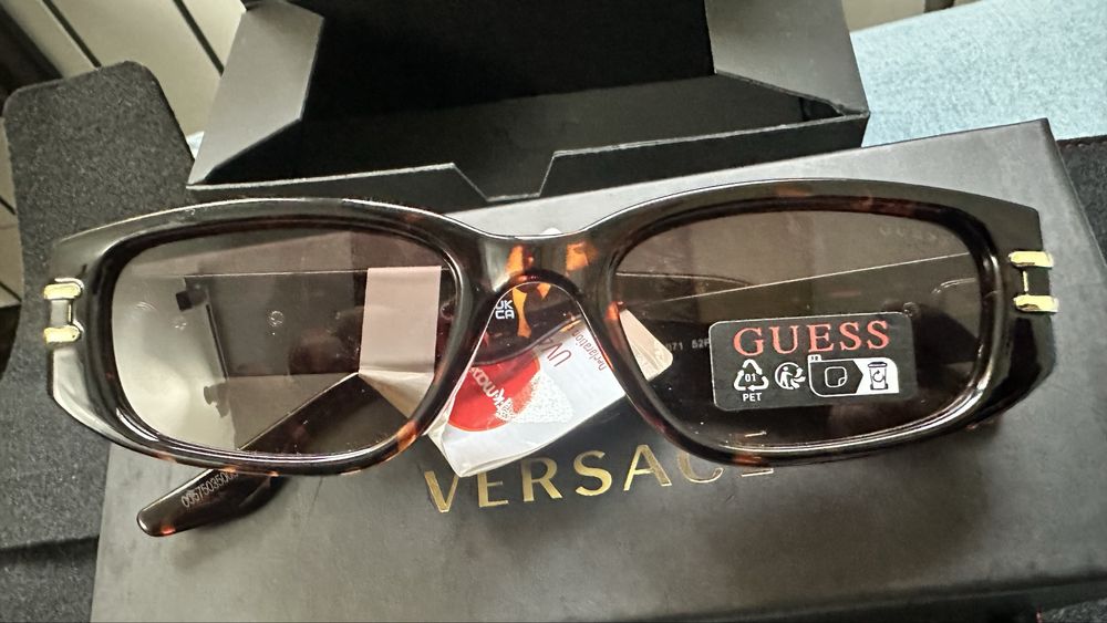 Ochelati dama si barbatesti Guess originali din UK