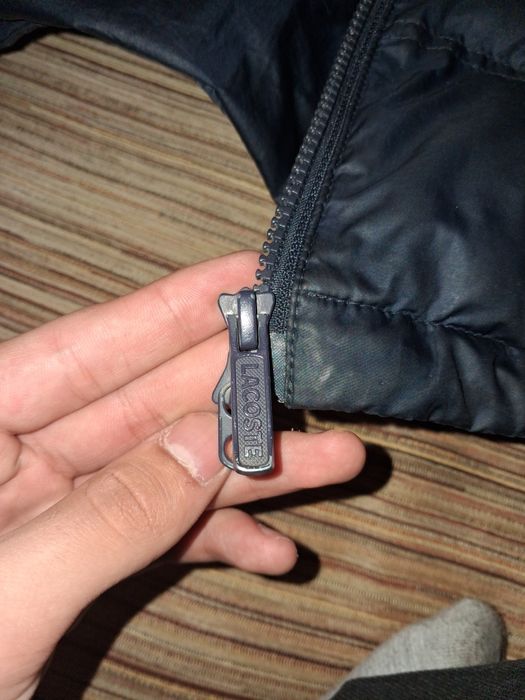 Пуховик лакоста.