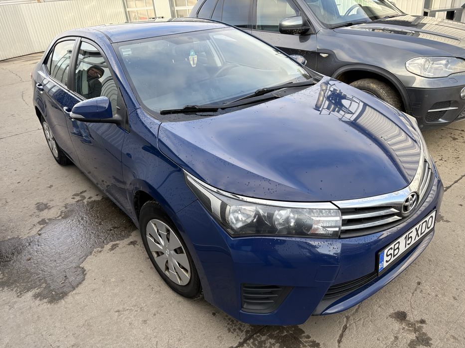 Toyota Corolla  inmatriculata,benzina stare foarte buna ,proprietar!