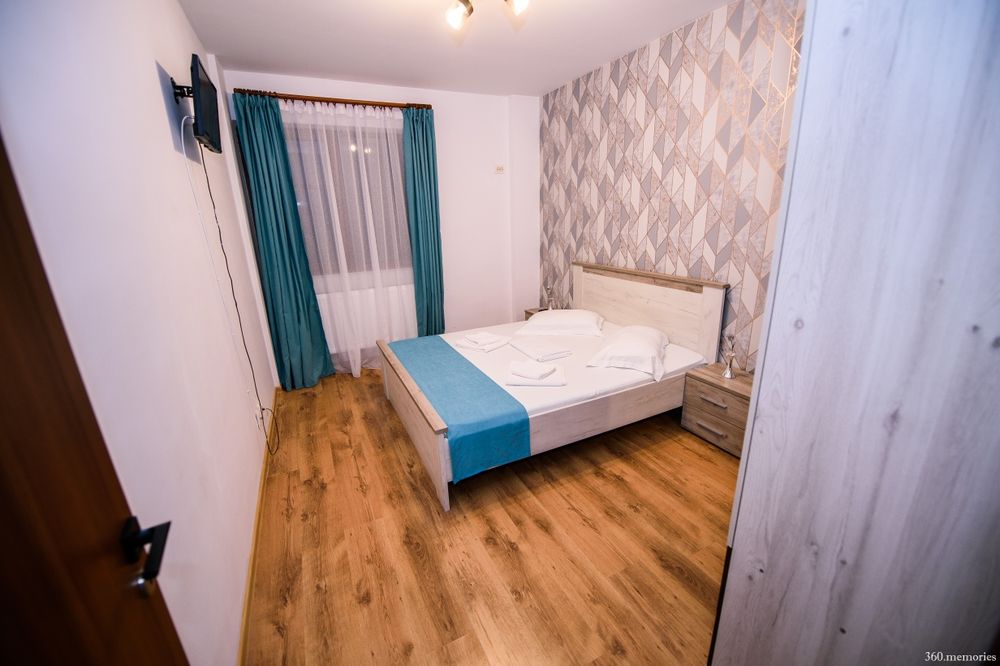 Apartament la parter cu gradina