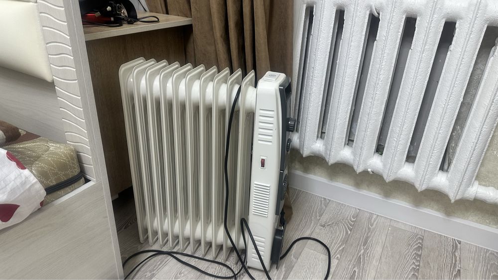 Масляный обогревател