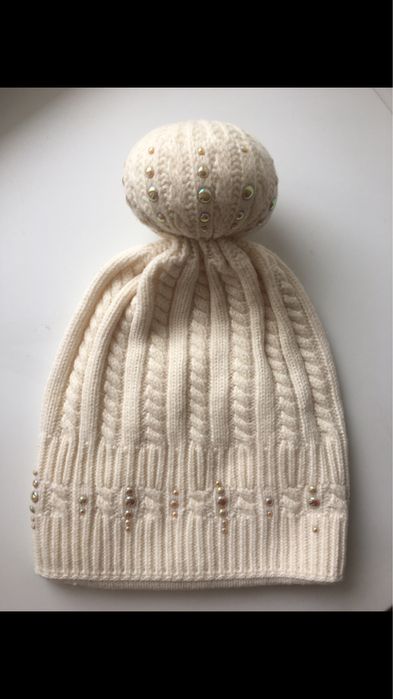 Продам теплую шапку Tavitta